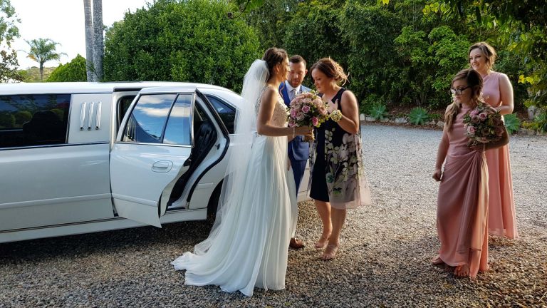 Another beautiful wedding party exiting our stretch limousine