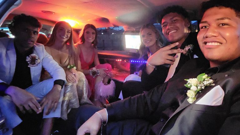 looking great! ready for their school formal, 6 youth dressed up and ready to get to their formal in the back of our 9 seater limo