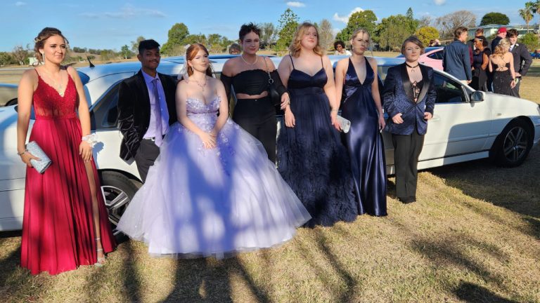 Share a limo ride to your School formal in our 9 seater white limo with golden trims