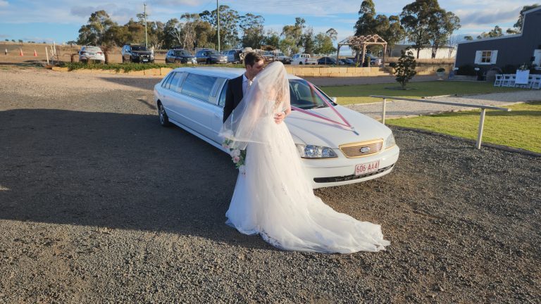 Our 9 seater limo with a lovely wedded couple