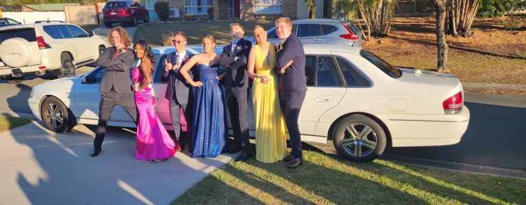 Our 9 seater limo and seven youth on their formal day