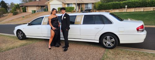 Look smart and arrive in style with our 9 seater white limo with gold trims!