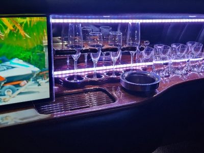 Inside our 9 seater limo is a mini bar! and TV, new sound system and mood lighting